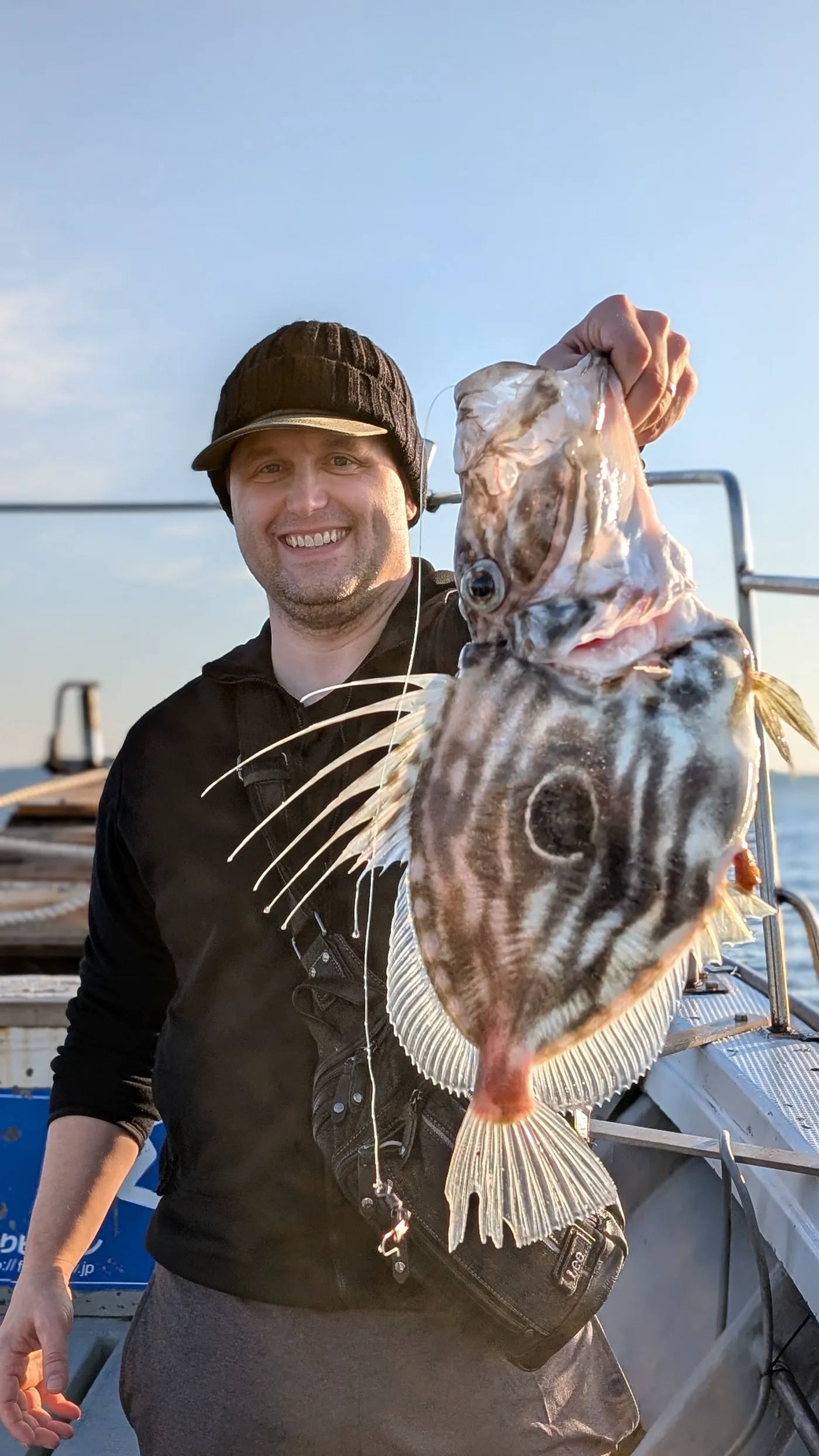 Dr. Baker with a John Dory caught in Japan